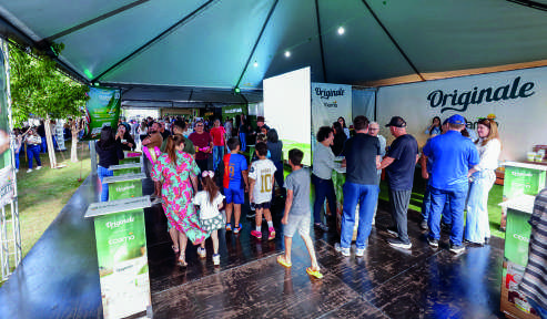 Rua do Cooperativismo próxima aos campos e quadras